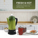 Fresh & Hot coffee to go with your morning breakfast or just sneak a cup any time of day.  Coffee Percolator on kitchen counter next to breakfast, coffee mug and hot cereal.