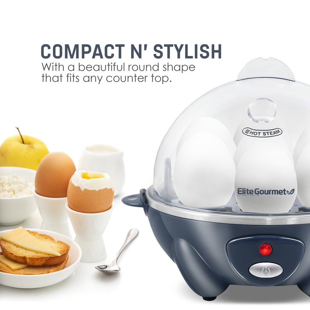 Compact N' Stylish with a beautiful round shape that fits any counter top. Egg cooker next to cooked eggs, fruit and toast.