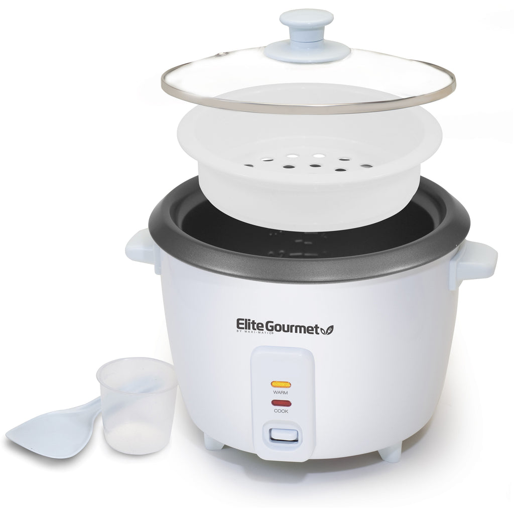 Parts & accessories displayed separately.  Glass lid, steamer basket, rice pot, main rice cooker.  Plus rice spatula and measuring cup.
