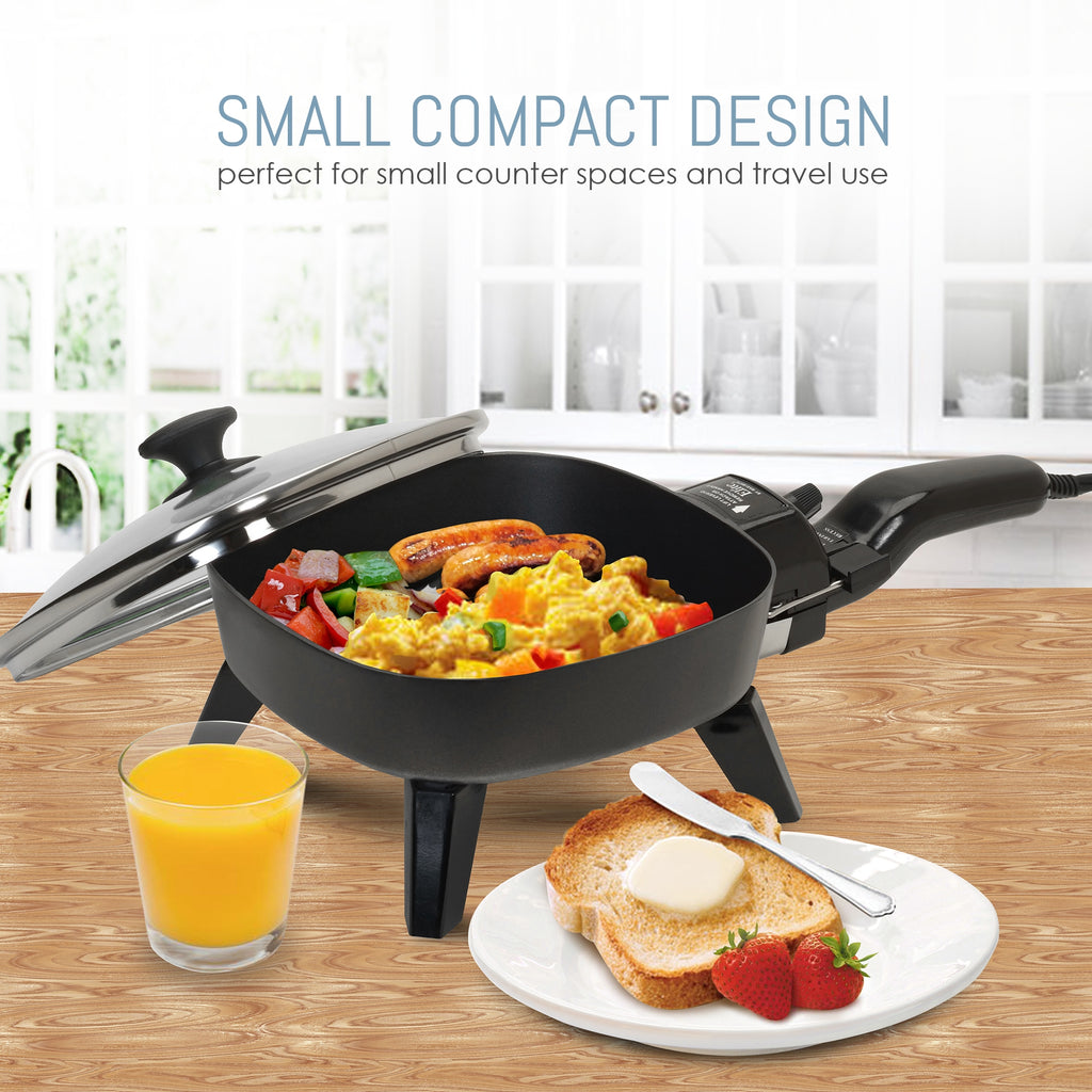 Small compact design perfect for small counter spaces and travel use.  Mini skillet on counter with scrambled eggs, toast and orange juice.