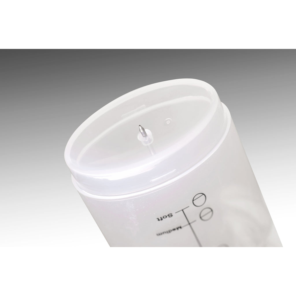Underside of measuring cup with piercing pin.